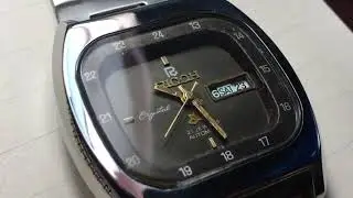 A very old Ricoh Crystal automatic watch view mechanics and front.Model number:- 61669AC