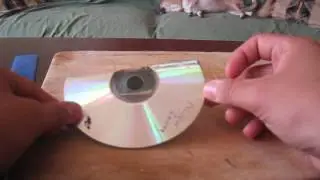 Soporte para celulares con un CD