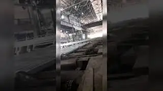 hot metal pushed by hydraulic pusher bars