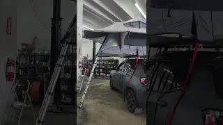 Installed Smittybilt Overlander Roof Top Tent on a Jeep Compass