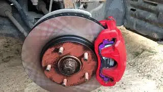 Замена тормозных дисков и колодок на Mitsubishi Lancer X.