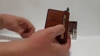 Портсигар с автоматической подачей сигарет и зажигалкой
