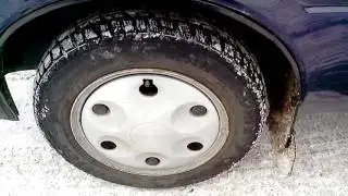 Why does the front wheel rub against the guard and how can I fix it?