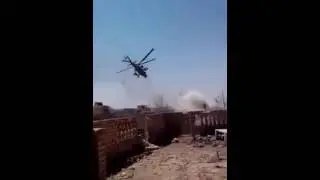 Mi-35M and Bell 407 of Iraq's army aviation providing close air support to Iraqi forces.