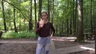 Woman walks near a group of insects