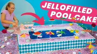 Jello-filled SWIMMING POOL CAKE with  marshmallow floaties 🍰🤣 | How to Cake It With Yolanda Gampp