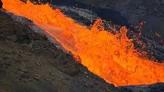 Lava flows into Meradalir down a steep hill - Fagradalsfjall volcano - Iceland 10 July 2021