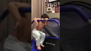 Topless kids in trampoline