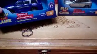 Распаковка коллекционных машин на пружинном механизме