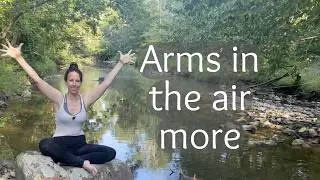 hand squeezes with arms in the air