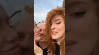 kissing her friend. 