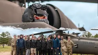 Michigan Football + Wrestling fly Blackhawks with Michigan Army National Guard