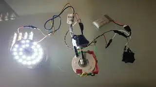 Small Electric Ac Generator with a Dc motor and a magnet
