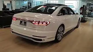 Mary taking delivery of the Audi  2023 A8 L