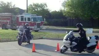 Officer Josh Jackson of the Coppell Police riding during the pollice motor cycle competition