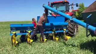 Plow PShK 5 Getman with a device for applying fertilizers. Tractor Case case
