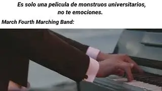 Hombre tocando piano en llamas con Monsters University de fondo