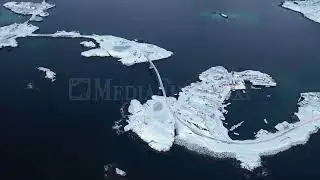 Stock Video - Aerial view of Hamnoy bridge in Reine Norway during winter