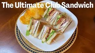 A TRIPLE DECKER DELIGHT: Turkey, Ham & Cheese Club Sandwich With Bacon, Avocado, Lettuce & Tomatoes