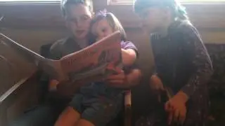 Aidan Reading to the Girls