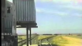 Elevated Offset Collision of Freight Locomotive with Loaded 40 ft. Container