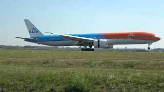 B777, Orange pride livery, smoky landing, late nose wheel touchdown. One of my favourite videos!