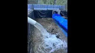 DIY Flood Barrier with Hay Bales