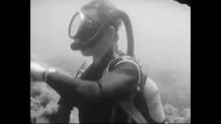 Underwater Scuba Fight of Vintage Divers