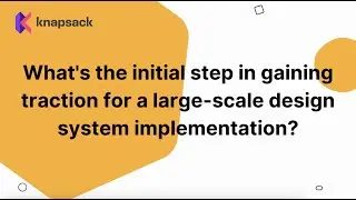 What's the initial step in gaining traction for a large scale design system implementation?