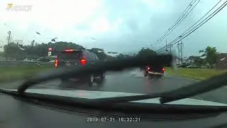 Highway flooded, car stuck