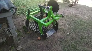 картофелекопалка грохотная в работе