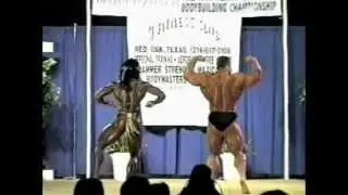 IFBB Pro Dorian Yates and IFBB Pro Lesa Lewis guest pose at the 1997 NPC Heart Of Texas