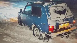 Heavy snowfall. A stock Niva on studded Kama tires versus snowy hills. Something went wrong.