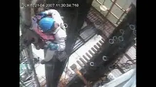 Derrickman Lifted By The Elevator
