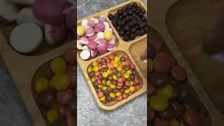 Filling platter with candy chocolate & gummy