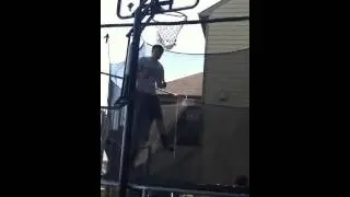 Trampoline basketball dunk