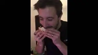 Akuma Eats a Sandwich