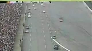 Jeff Gordon drives through a barrage of beer cans to win at Talladega 2004