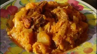 Stewed potatoes with cabbage and ribs