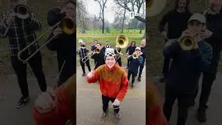 Marching Band Goes Around Giving People Theme Music