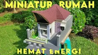 cinematic miniatur rumah hemat energi