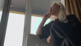 Girl smoking and spitting on her balcony and threw cigarettes out FULL VIDEO