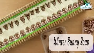 Winter Themed Cold Process soap with cute Snow Bunny soap dough embeds.