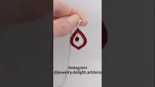 Hot enamel pendant with rhodolite