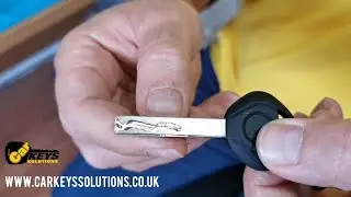Cutting a New Car Key -  Car Key Cutting: Decoding, Crafting, and Understanding the Mechanics 🗝️🚗
