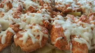 Chicken Breast in Sour Cream Sauce with Cheese in the Oven