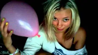 angie playin with 2 balloons