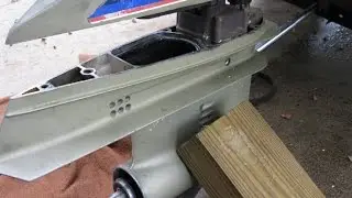 How to remove the lower unit on a outboard engine