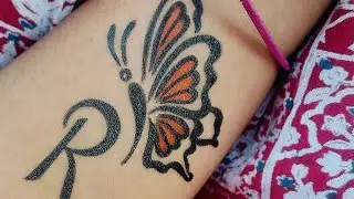 R letter tattoo design with butterfly 🦋 #easytutorial #howtomaketemporarytattoo #temporarytattoo