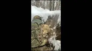 Ukrainian soldier tactically clears a trench